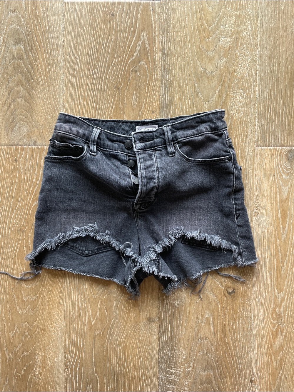 Good American Black Distressed Cutoff Denim Shorts